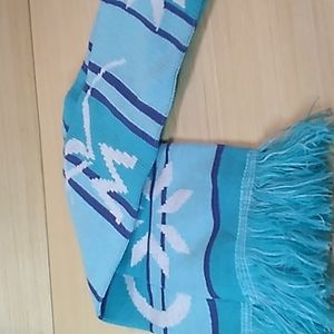 6 x 62 inches including the fringe. Warm winter scarf from Morongo Casino